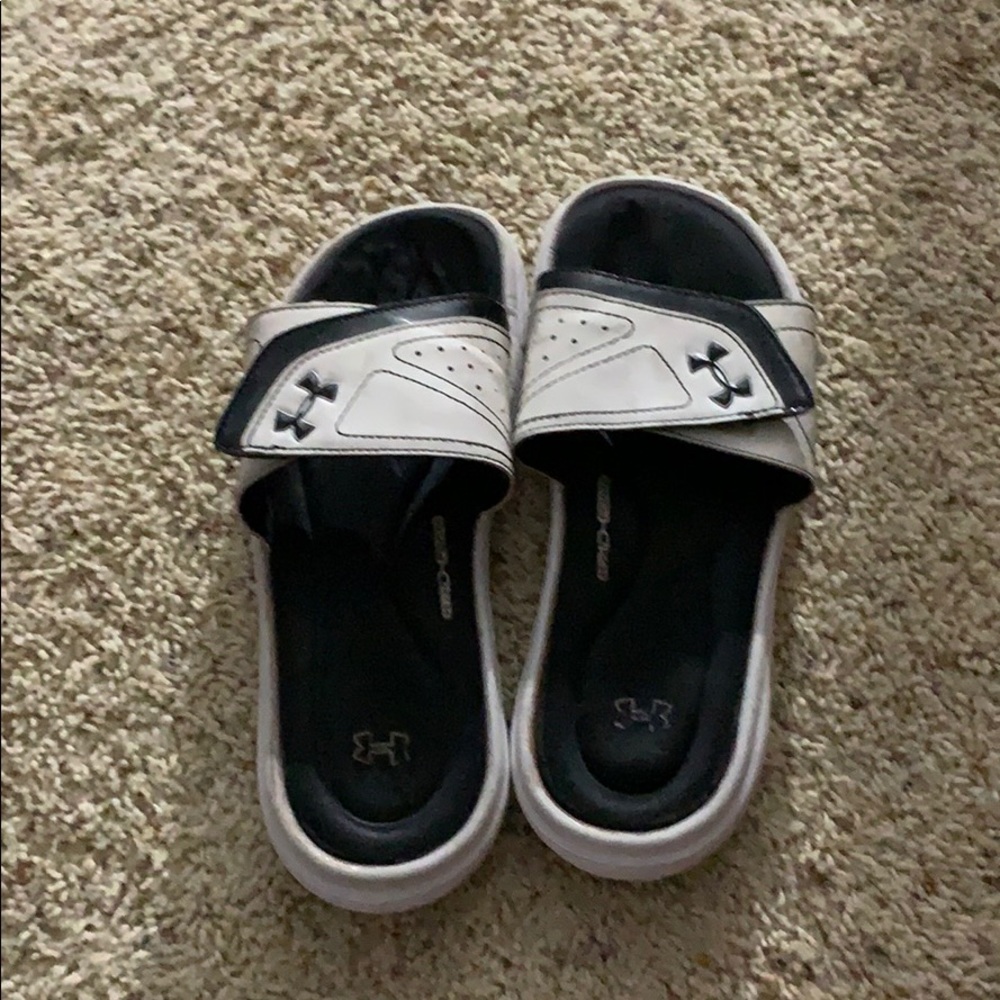 Black and white under armour slides